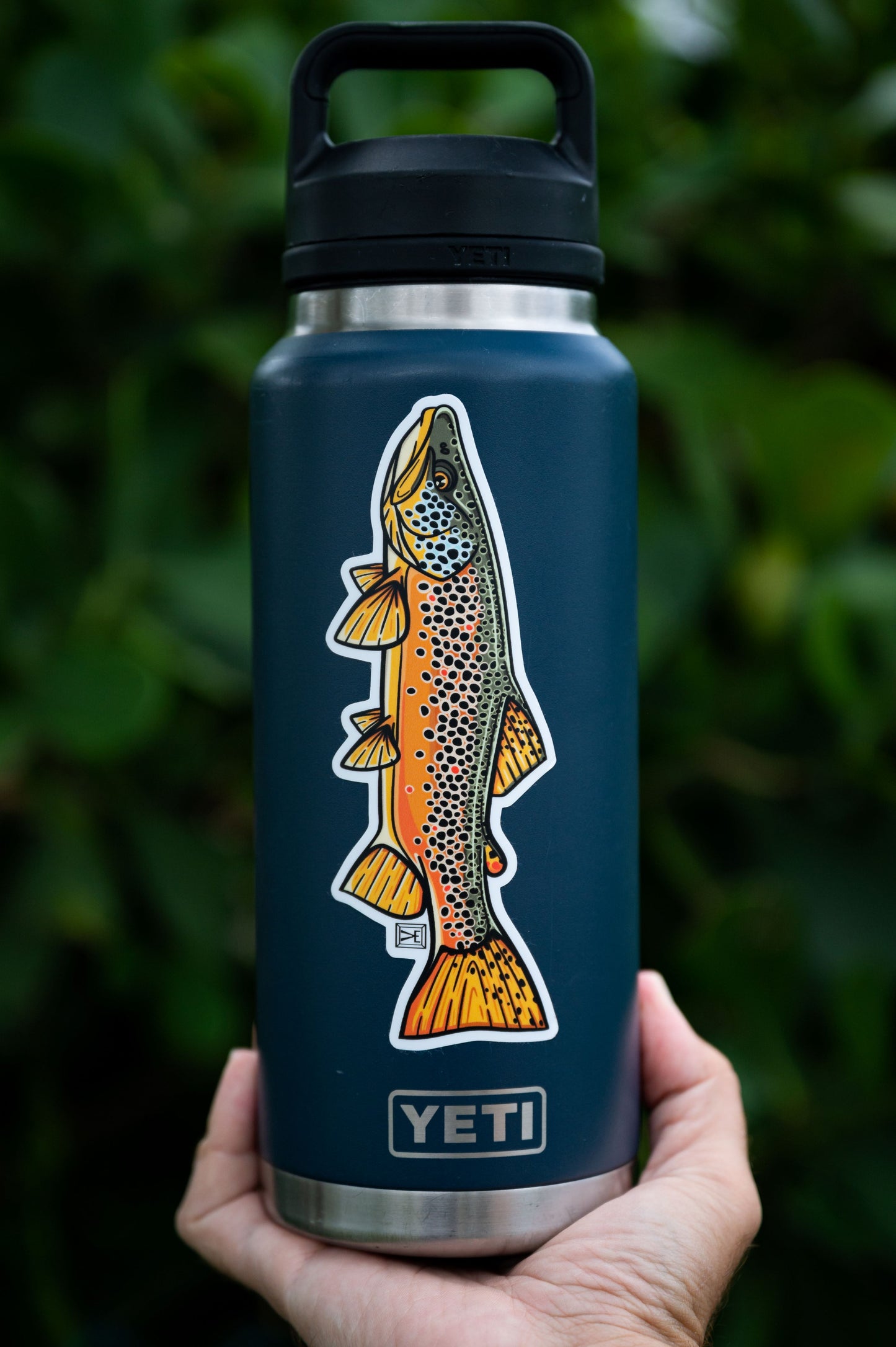 Brown trout sticker on Yeti tumbler