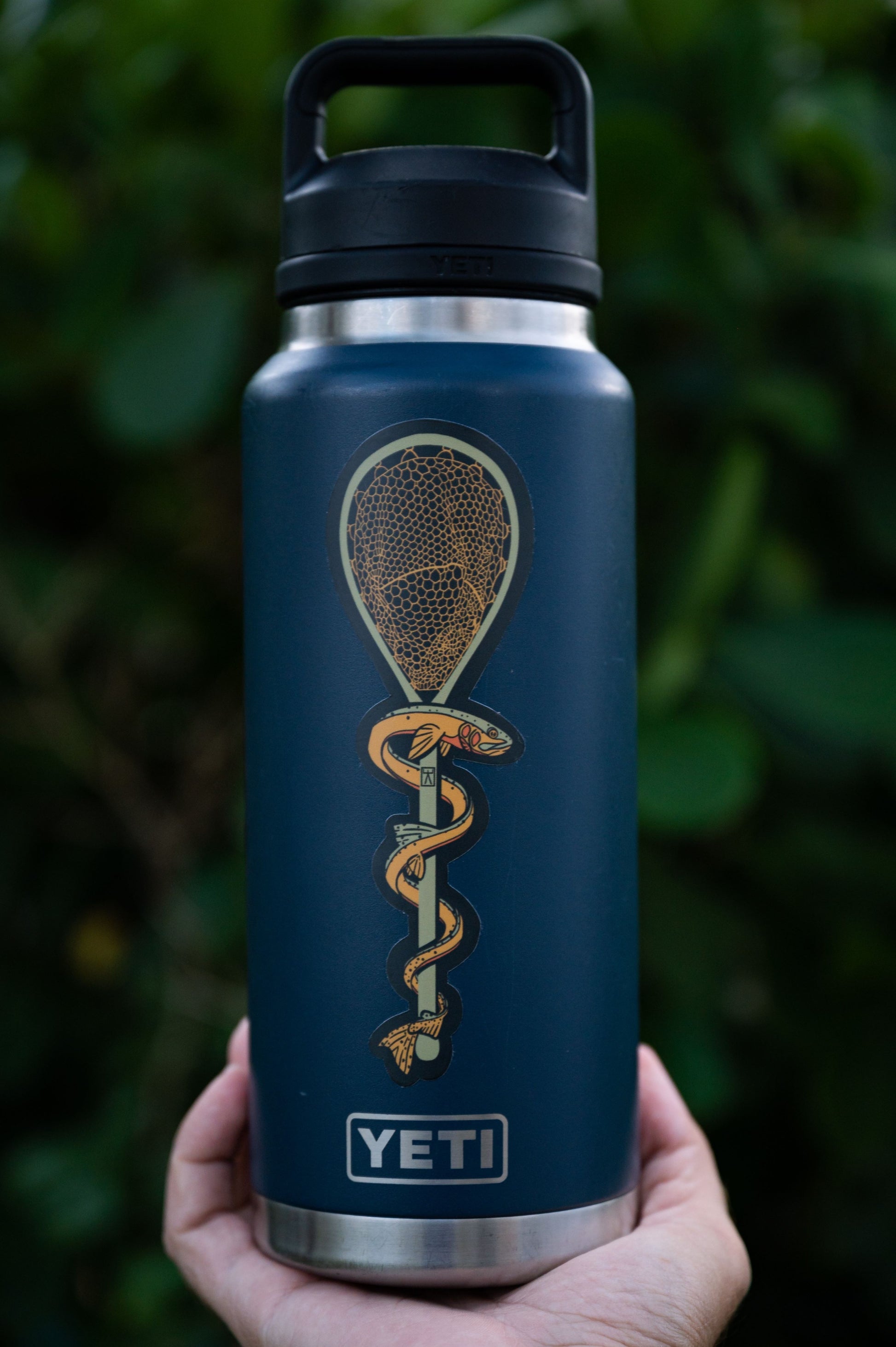 Trout therapy rod of asclepius sticker on Yeti tumbler